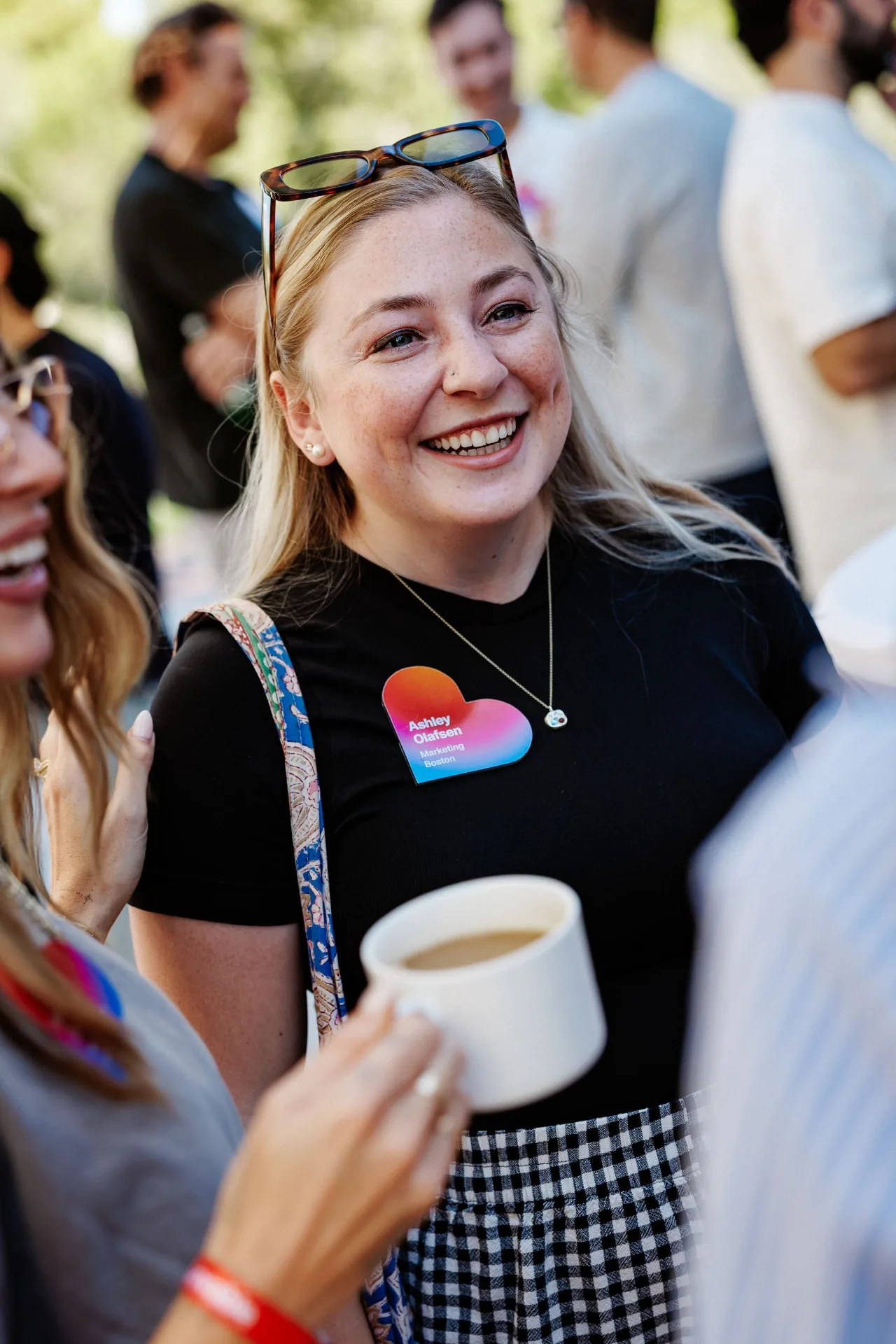 Ashley chatting with community members at an outdoor Lovable meetup