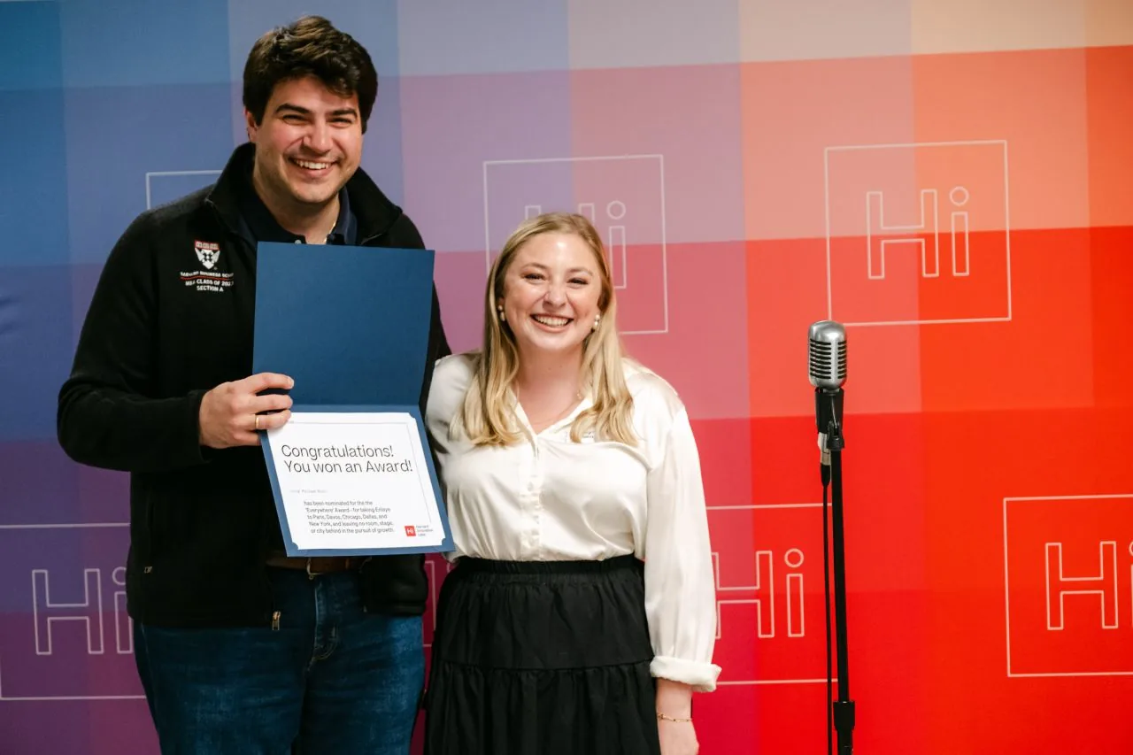 Ashley celebrating a Harvard Innovation Labs award on stage